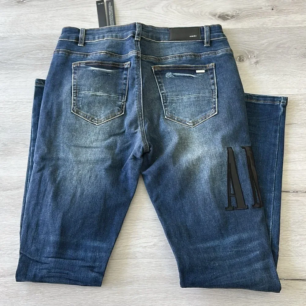 AMIRI Skinny-Fit Leather Appliquéd Distressed Jeans Blue/Black 32 NWT